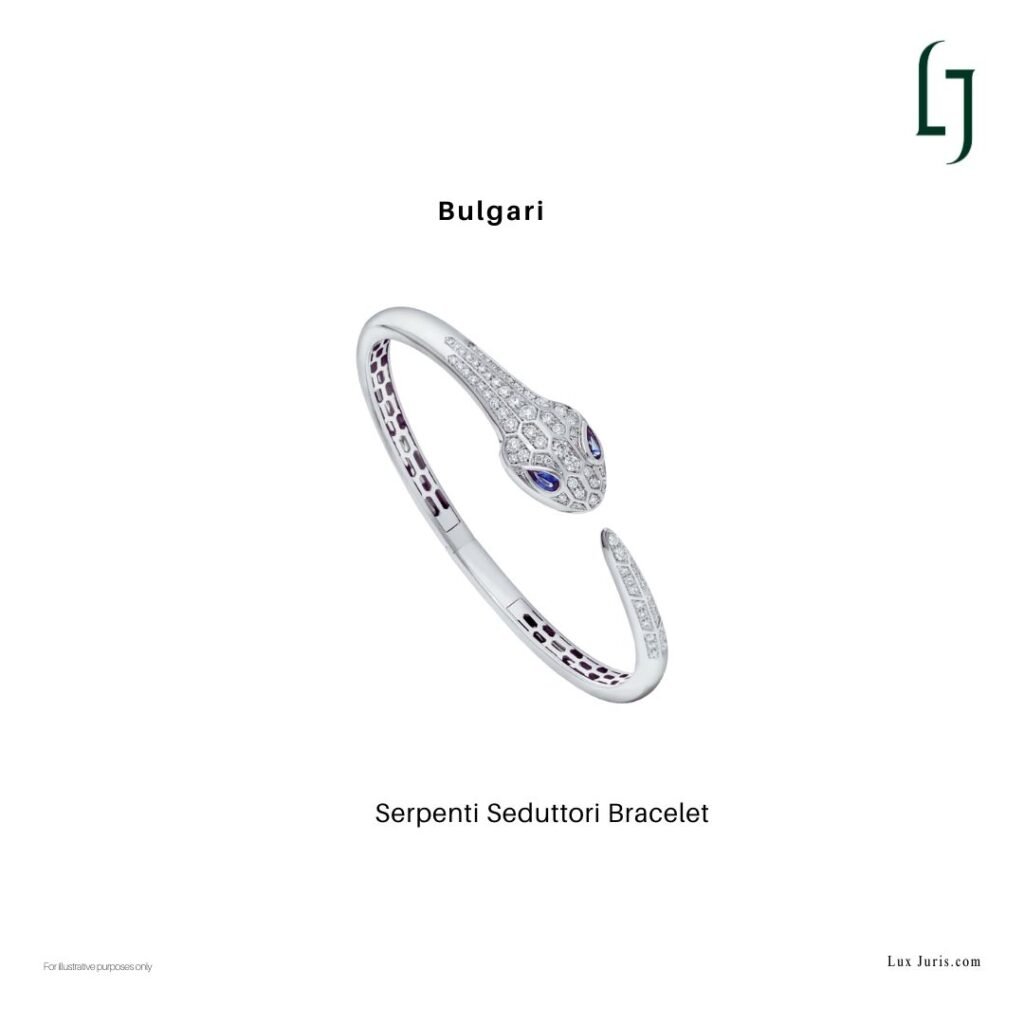 Bulgari Serpenti Seduttori bracelet showing a stylised serpent head with hexagonal pavé scales and pear-shaped gemstone eyes.